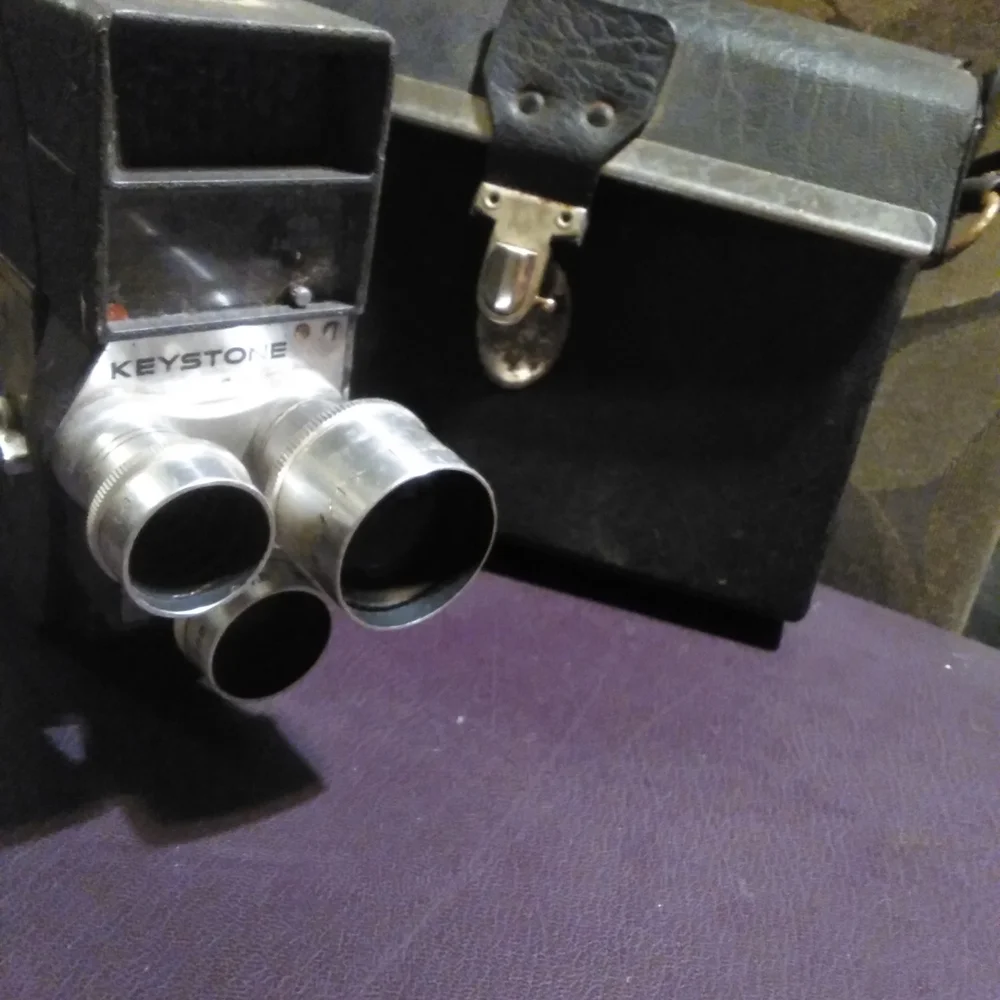Vintage Camera with Triple Lens System - Black and Silver